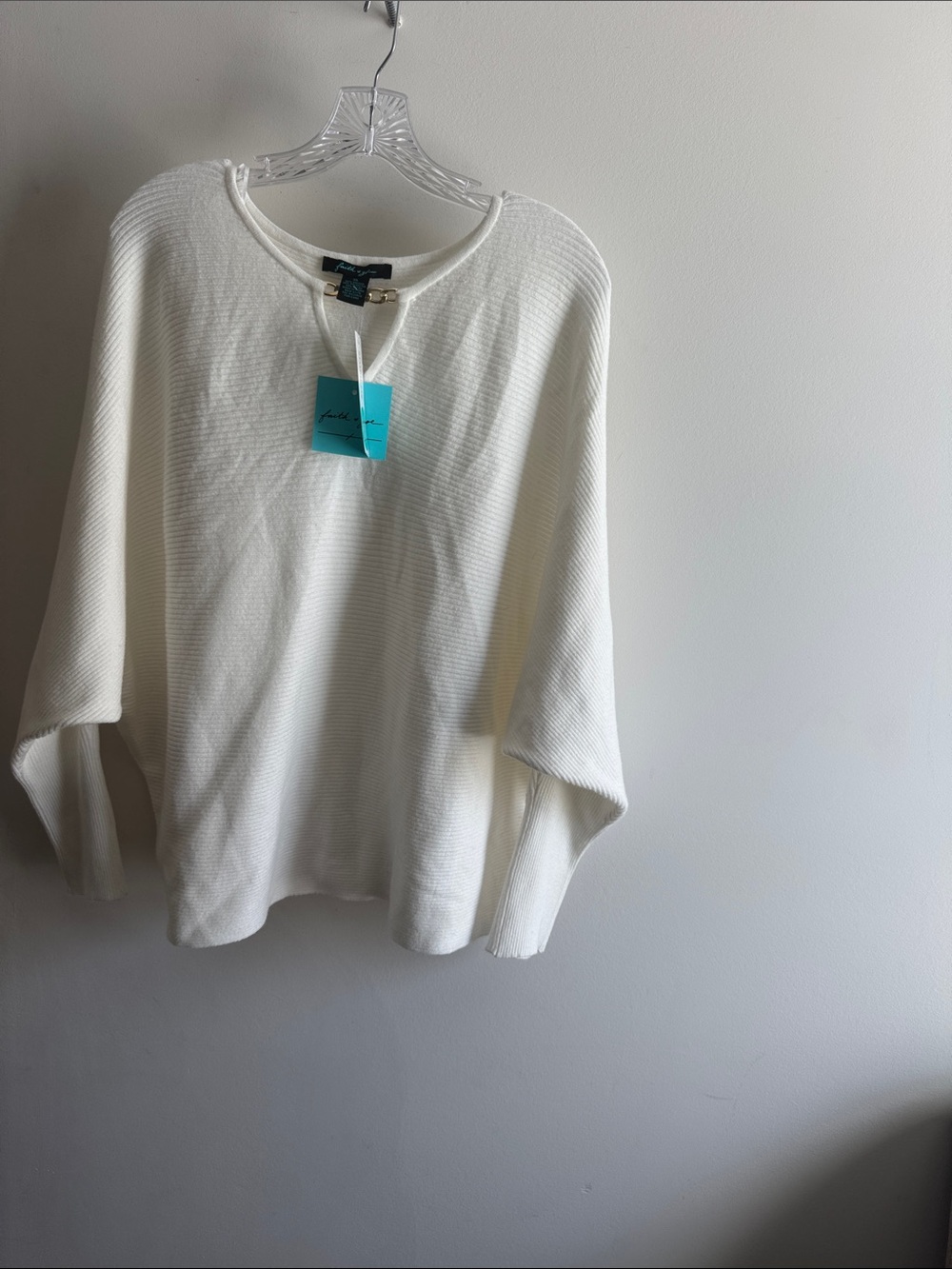 NWT Faith & Zoe white top features a stylish gold chain detail Size XL.